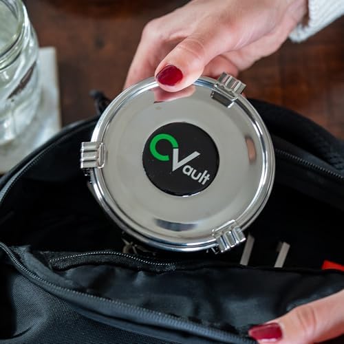 CVault 2 oz container held in one hand to show its travel size