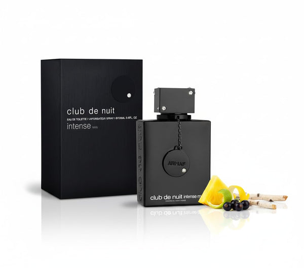 ARMAF Club de Nuit Intense Man black bottle beside its box and a lemon slice