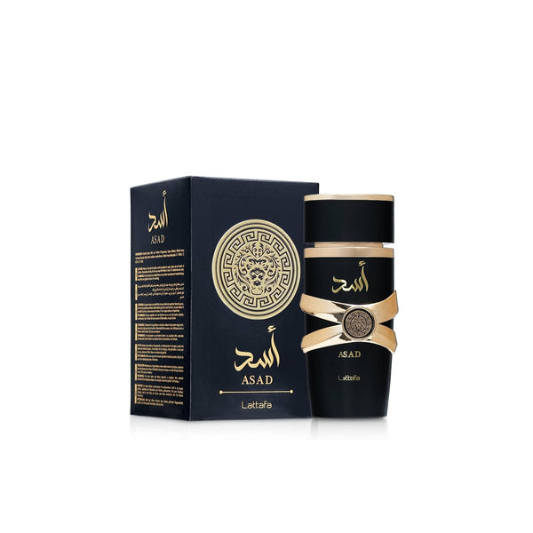 Lattafa Asad bottle standing beside its black and gold box