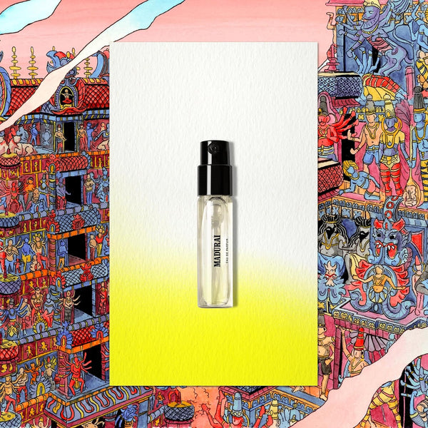 A single Memo Paris 1.5 ml travel spray against a colorful illustrated background
